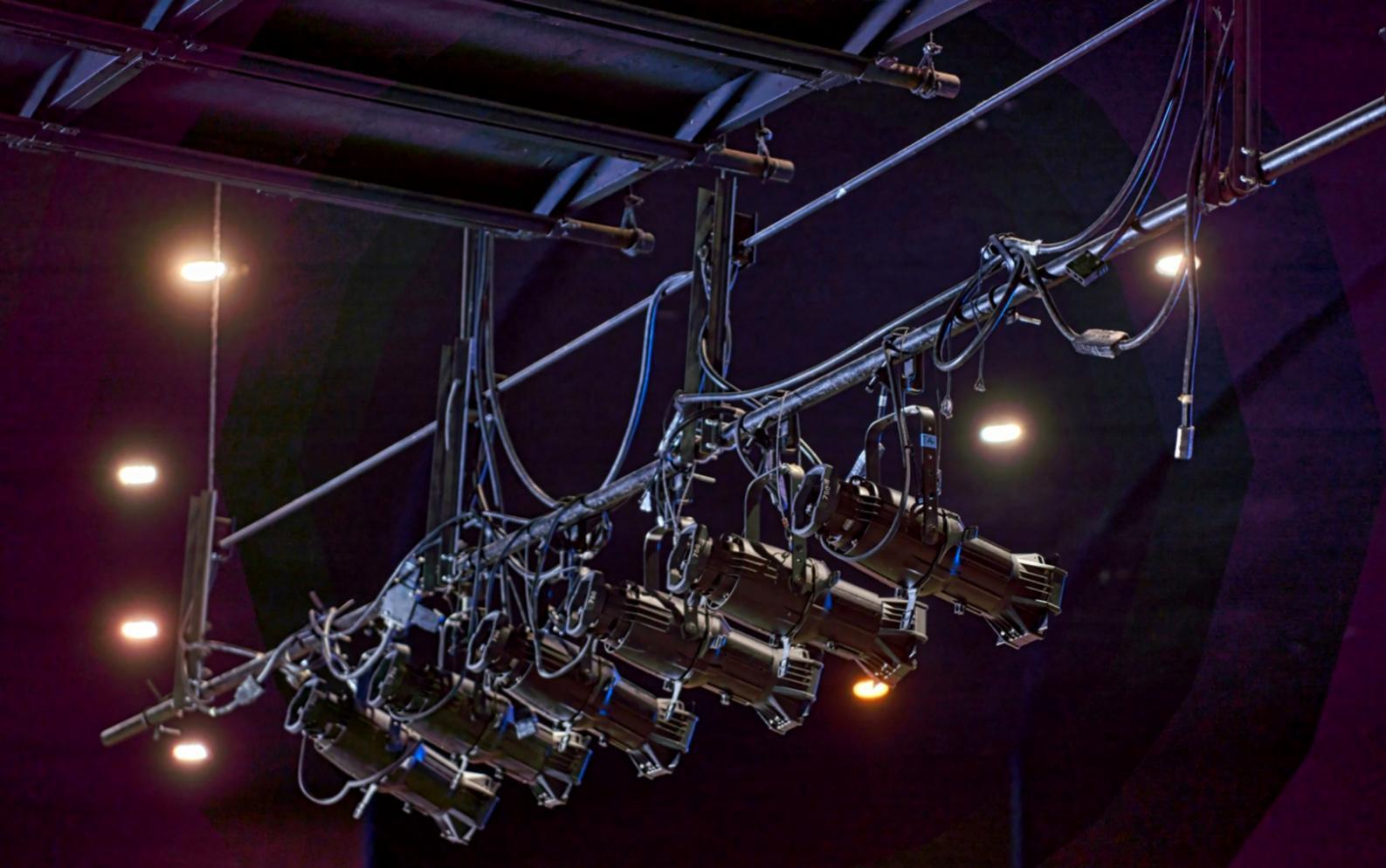 Professional voice recording environment with acoustic treatment and professional microphone setup